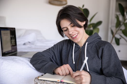 happy person journaling